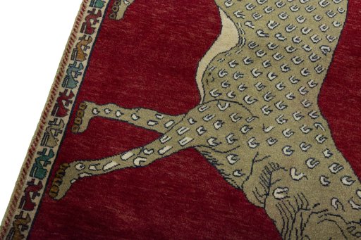 Backside of handmade 2000s Persian Gabbeh rug showing knot structure and weave density