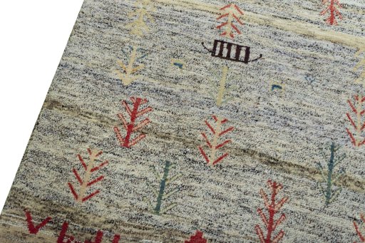 Backside of handmade 2000s Persian Gabbeh rug showing knot structure and weave density