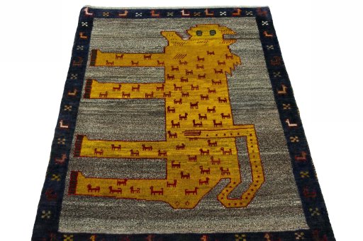 Surface texture of 2000s Persian Gabbeh rug with natural Wool and intricate pattern
