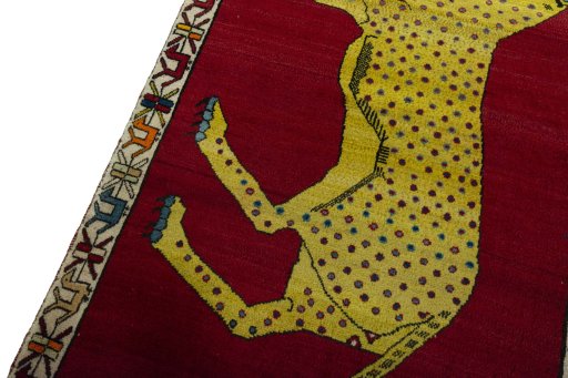 Backside of handmade 2000s Persian Gabbeh rug showing knot structure and weave density