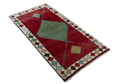 Close-up detail of 2000s Persian Gabbeh rug from Iran / Persia showing Wool weave