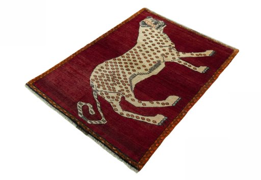 Corner detail of 2000s Persian Gabbeh rug showing border pattern and Wool pile