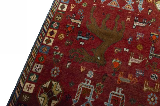 Backside of handmade 2000s Persian Gabbeh rug showing knot structure and weave density