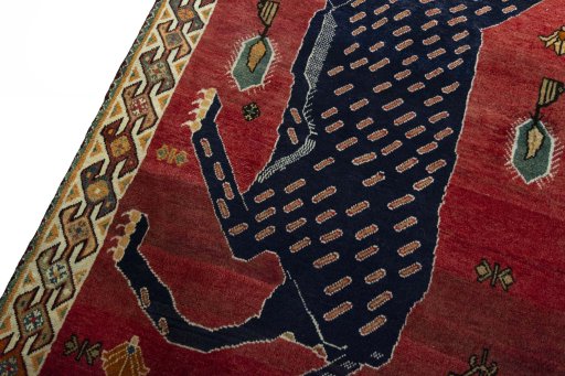 Backside of handmade 2000s Persian Gabbeh rug showing knot structure and weave density
