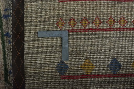 Close-up detail of 2000s Persian Gabbeh rug from Iran / Persia showing Wool weave