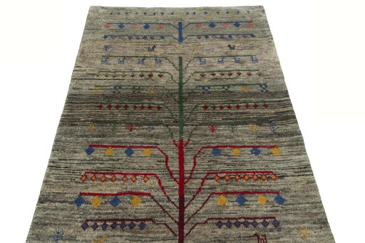 Surface texture of 2000s Persian Gabbeh rug with natural Wool and intricate pattern