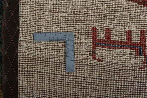 Close-up detail of 2000s Persian Gabbeh rug from Iran / Persia showing Wool weave