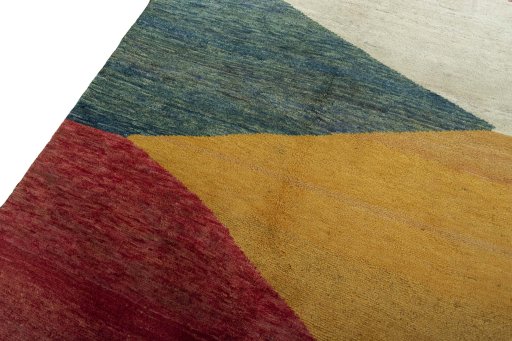 Backside of handmade 2000s Persian Gabbeh rug showing knot structure and weave density