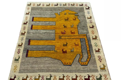 Surface texture of 2000s Persian Gabbeh rug with natural Wool and intricate pattern