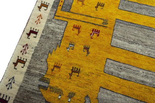Backside of handmade 2000s Persian Gabbeh rug showing knot structure and weave density
