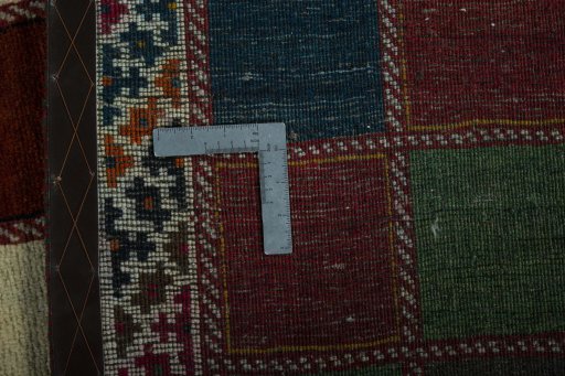 Close-up detail of 2000s Persian Gabbeh rug from Iran / Persia showing Wool weave