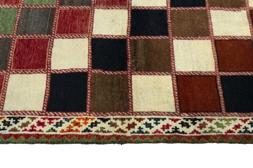 Close-up detail of 2000s Persian Gabbeh rug from Iran / Persia showing Wool weave