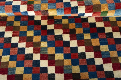 Full view of New Persian Gabbeh rug from Iran / Persia, 230 × 155 cm in Multi Color tones