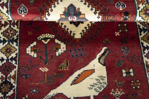 Full view of 2000s Persian Gabbeh rug from Iran / Persia, 175 × 97 cm in Red tones