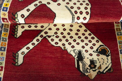Full view of 2000s Persian Gabbeh rug from Iran / Persia, 160 × 102 cm in Red tones