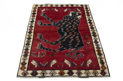 Surface texture of 2000s Persian Gabbeh rug with natural Wool and intricate pattern