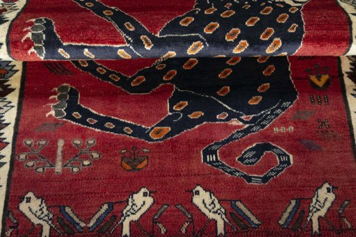 Full view of 2000s Persian Gabbeh rug from Iran / Persia, 163 × 115 cm in Red tones