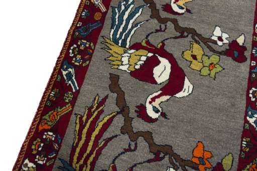 Backside of handmade 2000s Persian Gabbeh rug showing knot structure and weave density
