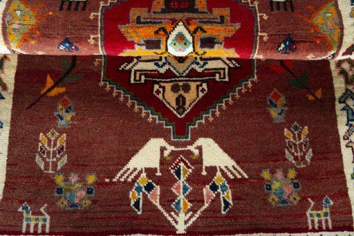 Full view of 2000s Persian Gabbeh rug from Iran / Persia, 147 × 100 cm in Red tones