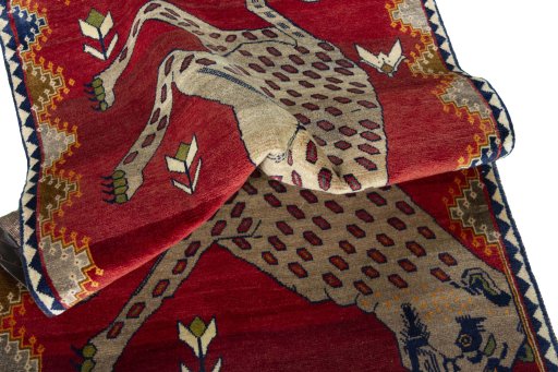 Corner detail of 2000s Persian Gabbeh rug showing border pattern and Wool pile