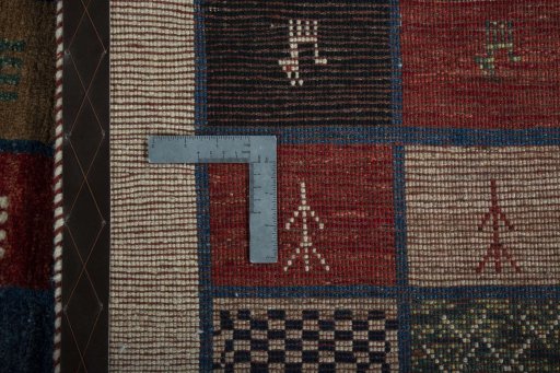 Close-up detail of 2000s Persian Gabbeh rug from Iran / Persia showing Wool weave