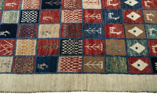 Close-up detail of 2000s Persian Gabbeh rug from Iran / Persia showing Wool weave