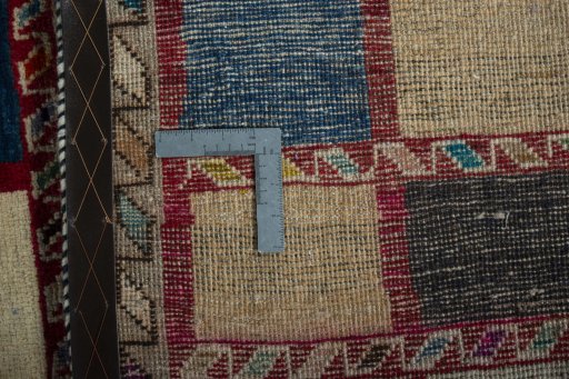 Close-up detail of 2000s Persian Gabbeh rug from Iran / Persia showing Wool weave