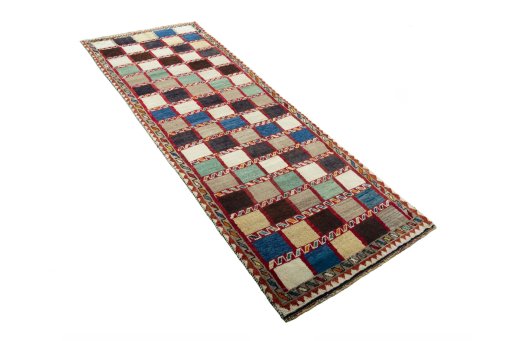 Close-up detail of 2000s Persian Gabbeh rug from Iran / Persia showing Wool weave