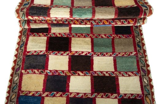 Full view of 2000s Persian Gabbeh rug from Iran / Persia, 280 × 104 cm in Multi Color tones