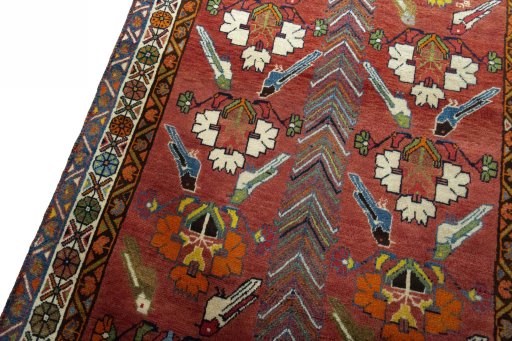 Backside of handmade 1970s Persian Gabbeh rug showing knot structure and weave density