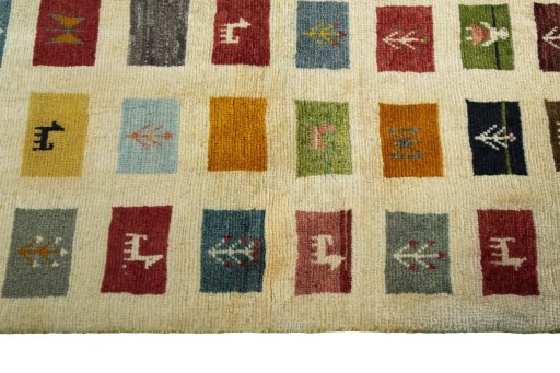 Close-up detail of 2000s Persian Gabbeh rug from Iran / Persia showing Wool weave
