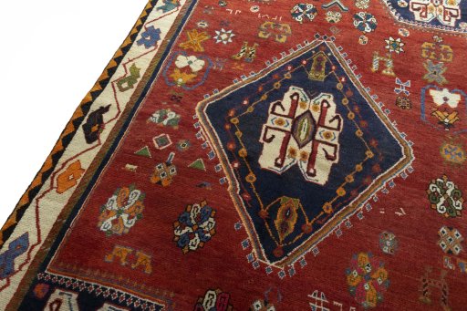Backside of handmade 2000s Persian Gabbeh rug showing knot structure and weave density