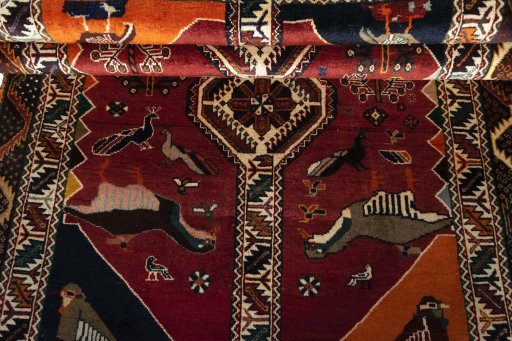 Full view of 2000s Persian Gabbeh rug from Iran / Persia, 235 × 130 cm in Red tones