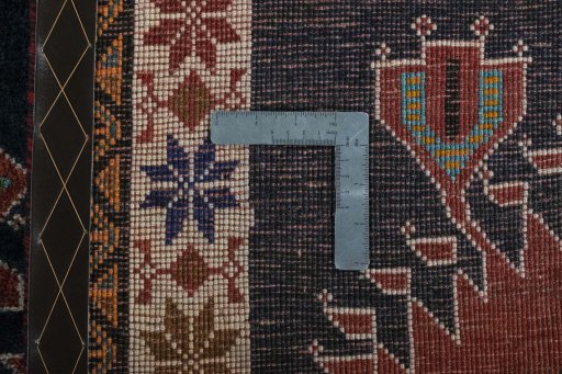 Close-up detail of 2000s Persian Gabbeh rug from Iran / Persia showing Wool weave