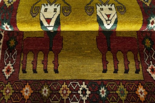 Full view of 2000s Persian Gabbeh rug from Iran / Persia, 153 × 102 cm in Yellow tones