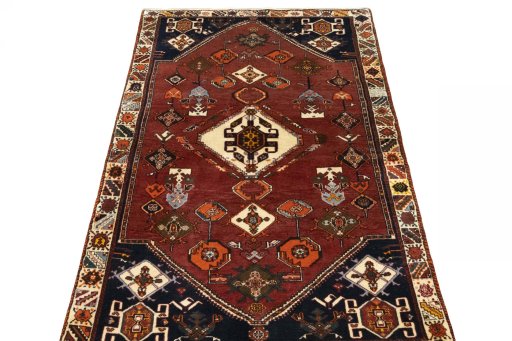 Surface texture of 2000s Persian Gabbeh rug with natural Wool and intricate pattern