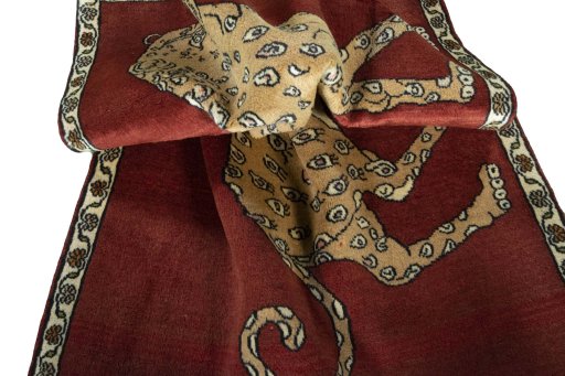 Corner detail of 2000s Persian Gabbeh rug showing border pattern and Wool pile