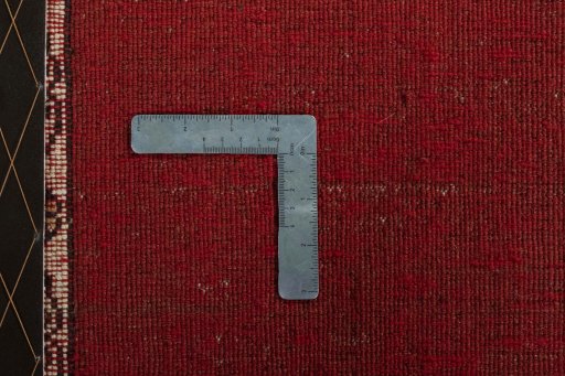Close-up detail of 2000s Persian Gabbeh rug from Iran / Persia showing Wool weave