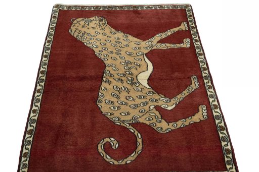 Surface texture of 2000s Persian Gabbeh rug with natural Wool and intricate pattern
