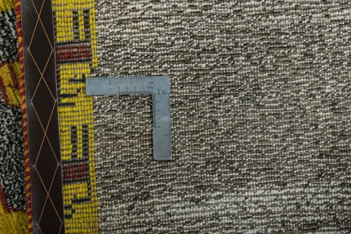 Close-up detail of 2000s Persian Gabbeh rug from Iran / Persia showing Wool weave