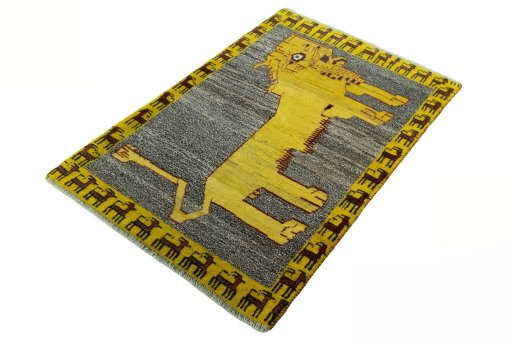 Corner detail of 2000s Persian Gabbeh rug showing border pattern and Wool pile