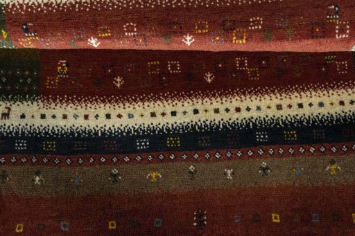 Full view of 2000s Persian Gabbeh rug from Iran / Persia, 142 × 101 cm in Red tones