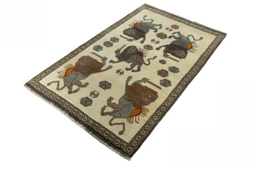 Corner detail of 2000s Persian Gabbeh rug showing border pattern and Wool pile