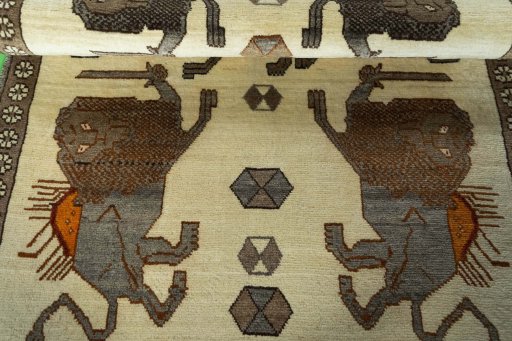 Full view of 2000s Persian Gabbeh rug from Iran / Persia, 192 × 122 cm in Beige tones