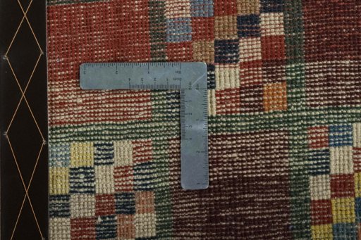 Close-up detail of 2000s Persian Gabbeh rug from Iran / Persia showing Wool weave