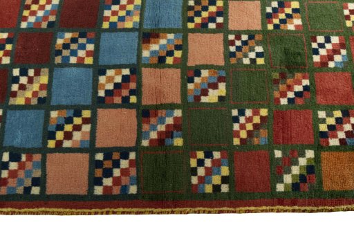 Close-up detail of 2000s Persian Gabbeh rug from Iran / Persia showing Wool weave