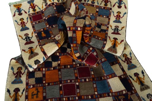 Corner detail of 2000s Persian Gabbeh rug showing border pattern and Wool pile