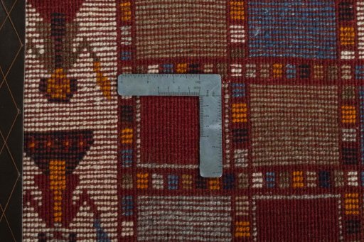 Close-up detail of 2000s Persian Gabbeh rug from Iran / Persia showing Wool weave