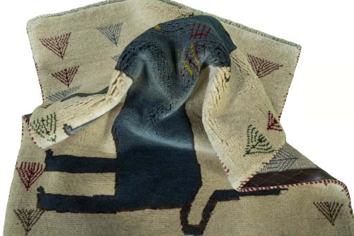 Corner detail of 2000s Persian Gabbeh rug showing border pattern and Wool pile