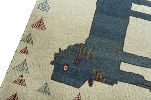 Backside of handmade 2000s Persian Gabbeh rug showing knot structure and weave density